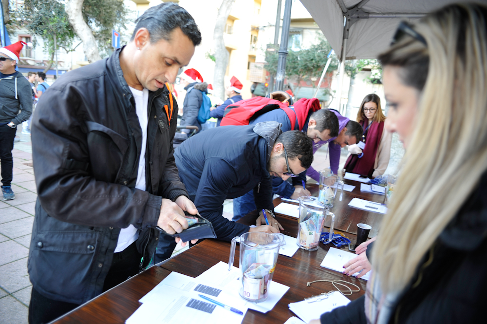 registration desk at the thomas smith charity swim in sliema