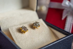 diamond earrings in a box given as a gift for valentine's day