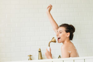 woman singing, singing in the shower, healthy life