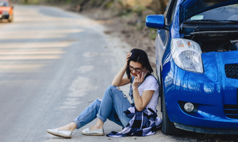 driver calling roadside assistance